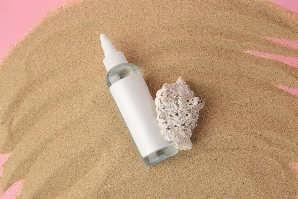 Bottle Serum Seashell Sand Pink Background Top View — Stock Photo, Image
