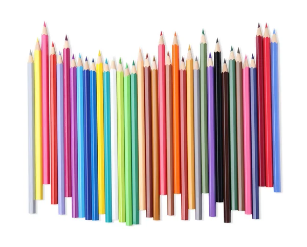 白い背景にカラフルな木製の鉛筆の多くは トップビュー — ストック写真