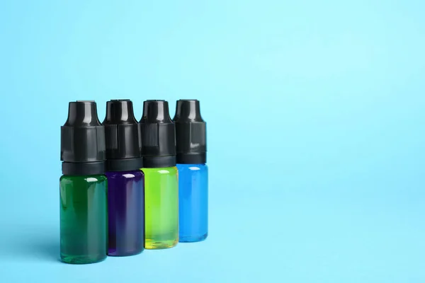 Flaskor Med Olika Livsmedel Färg Ljusblå Bakgrund Utrymme För Text — Stockfoto