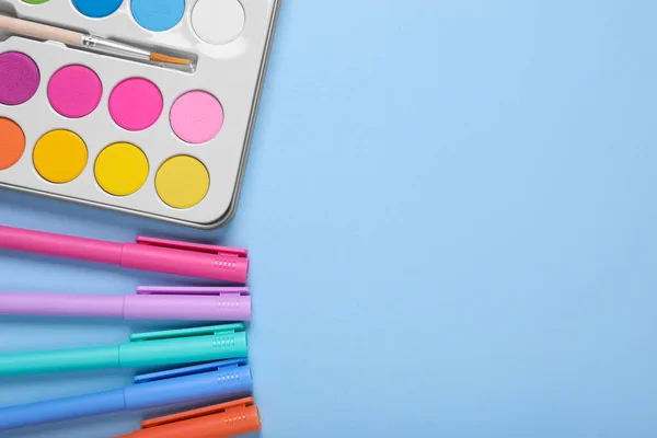 Watercolor Palette Brush Colorful Markers Light Blue Background Flat Lay — Stock Photo, Image