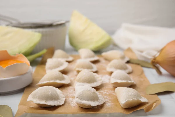Raw Dumplings Varenyky Tasty Filling Flour Parchment Paper Closeup — Foto Stock