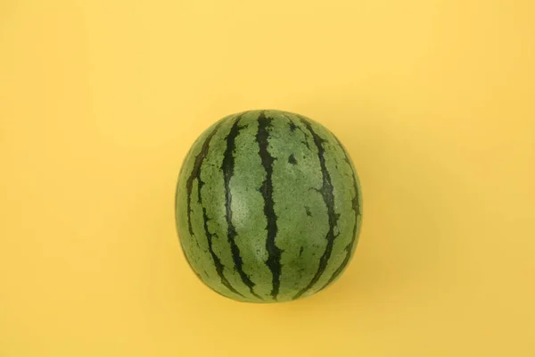 One Whole Ripe Watermelon Yellow Background Top View — Stock Photo, Image