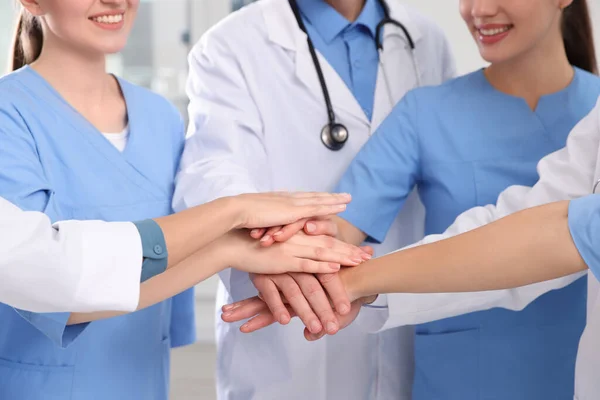 Team Medical Doctors Putting Hands Together Indoors Closeup — Stock Photo, Image