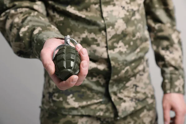 Soldier Holding Hand Grenade Light Grey Background Closeup Military Service — Stock Photo, Image