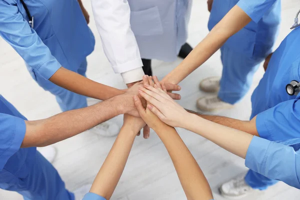Doctor Interns Stacking Hands Together Indoors Closeup — Stock Photo, Image
