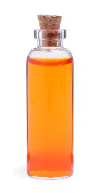 Beyaz arka planda bir şişe turuncu gıda boyası.