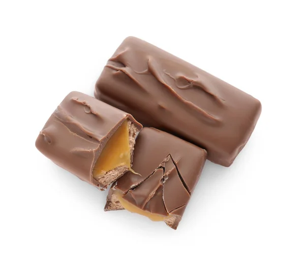 Trozos Barras Chocolate Con Caramelo Sobre Fondo Blanco Vista Superior — Foto de Stock