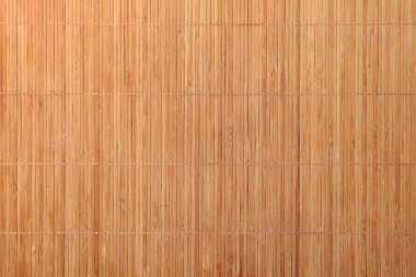 Arka plan olarak yeni bambu hasırı, üst görünüm