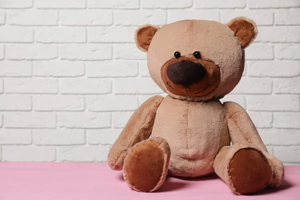 Cute Teddy Bear Pink Wooden Table White Brick Wall Space — Stock Photo, Image