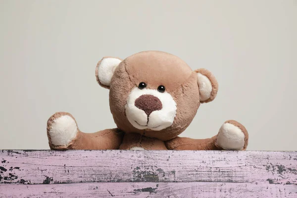 Cute Teddy Bear Pink Wooden Table Light Grey Background — Stock Photo, Image