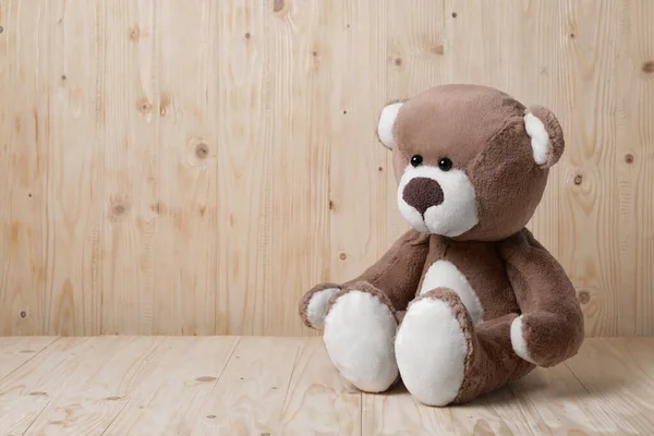 Cute Teddy Bear Table Wooden Wall Space Text — Stock Photo, Image