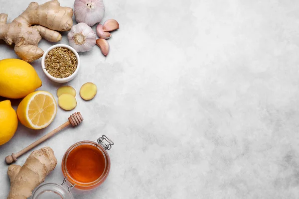 stock image Different natural cold remedies on light grey table, flat lay with space for text. Cough treatment