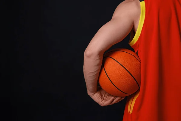 Athletic Man Basketball Ball Black Background Closeup Space Text — Stock fotografie