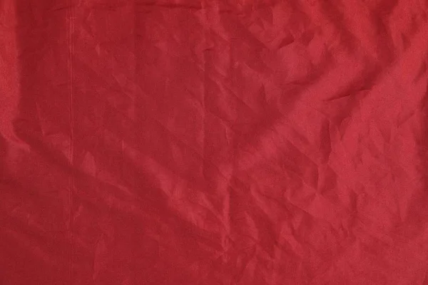 Zgnieciony Ciemnoczerwony Materiał Jako Tło Widok Góry — Zdjęcie stockowe