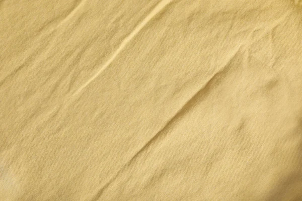 Τσαλακωμένο Ανοιχτό Κίτρινο Ύφασμα Φόντο Πάνω Όψη — Φωτογραφία Αρχείου