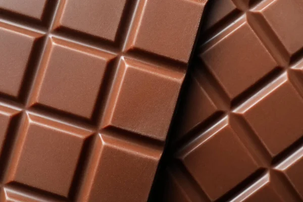 Вкусные Молочные Шоколадки Качестве Фона Вид Сверху — стоковое фото