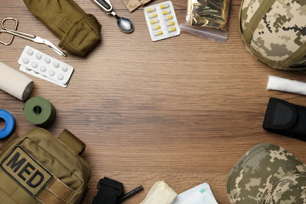 Frame Military First Aid Kit Wooden Table Flat Lay Space — Stock Photo, Image