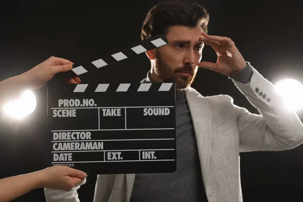 Actor Performing While Second Assistant Camera Holding Clapperboard Black Background — Zdjęcie stockowe