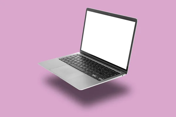 Bir Modern Laptop Menekşe Arka Planda Uçuyor — Stok fotoğraf