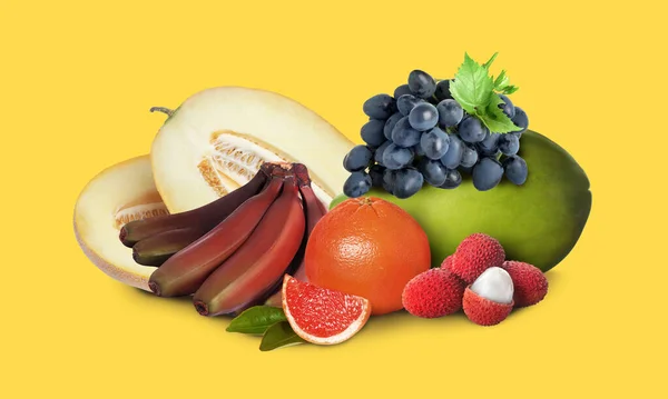 Muchas Frutas Frescas Diferentes Sobre Fondo Amarillo —  Fotos de Stock