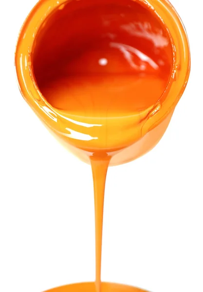 Pouring Orange Paint Can White Background Closeup — Fotografia de Stock