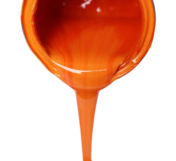Pouring Orange Paint Can White Background Closeup — Φωτογραφία Αρχείου