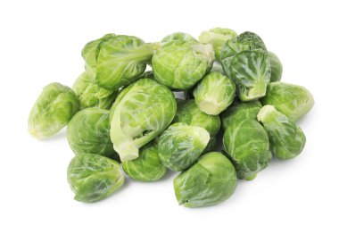 Heap of fresh green brussels sprouts on white background