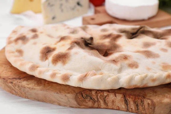 Delicious Cheese Calzone White Wooden Table Closeup — Stock Photo, Image