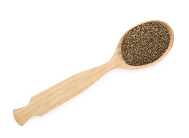 Kaşık dolusu kereviz tohumu beyaza izole edilmiş, üst manzara