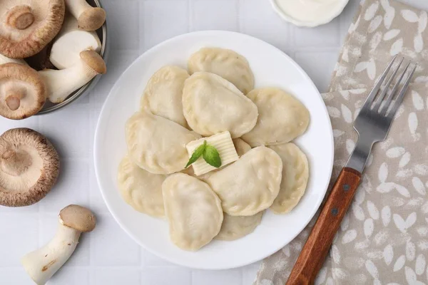 Delicious Dumplings Varenyky Mushrooms Butter Served White Tiled Table Flat — Stock Photo, Image