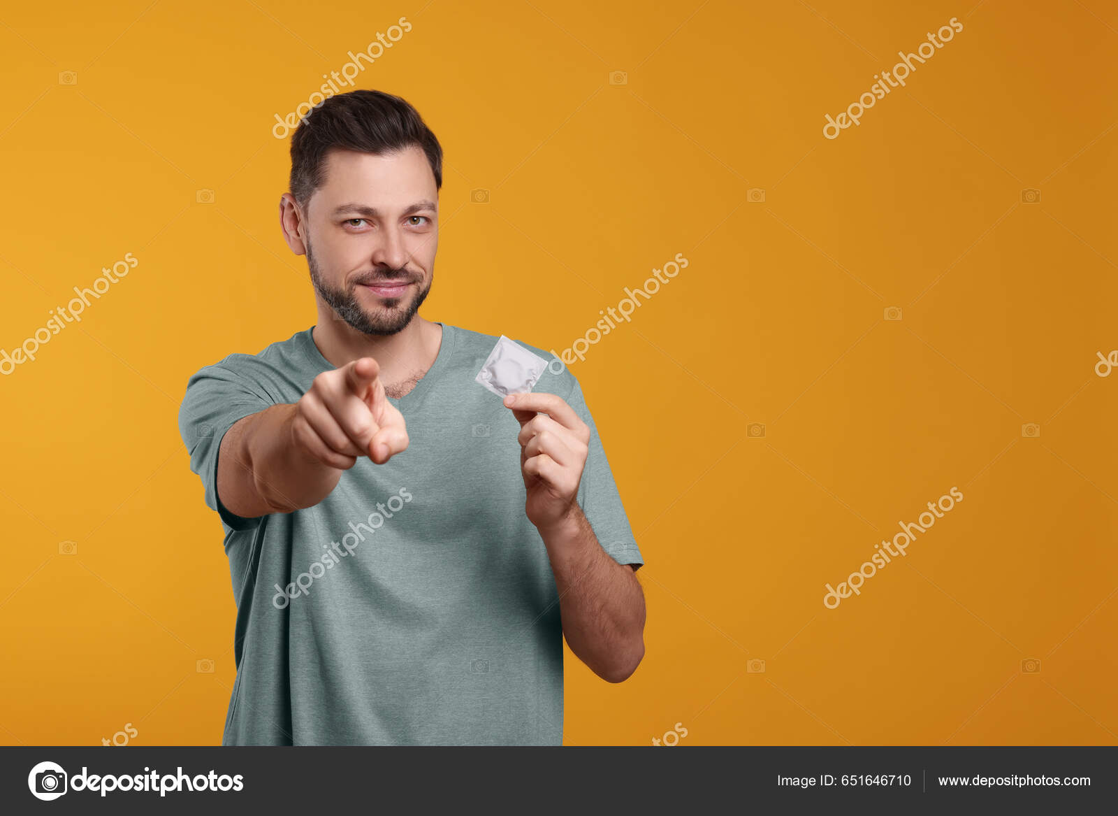Handsome Man Holding Condom Orange Background Space Text Stock.