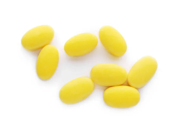 Chutné Žluté Dragee Bonbóny Bílém Pozadí Pohled Shora — Stock fotografie