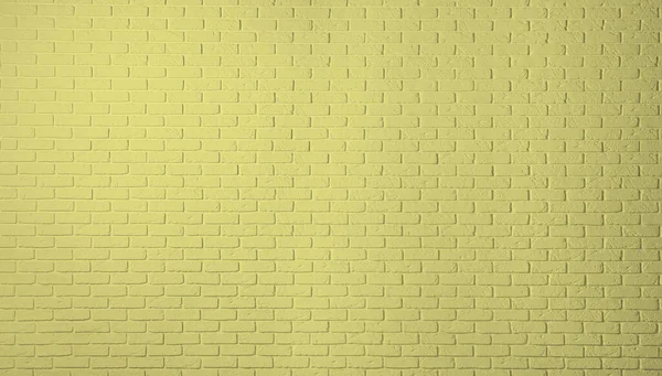 Texture of pale golden rod color brick wall as background