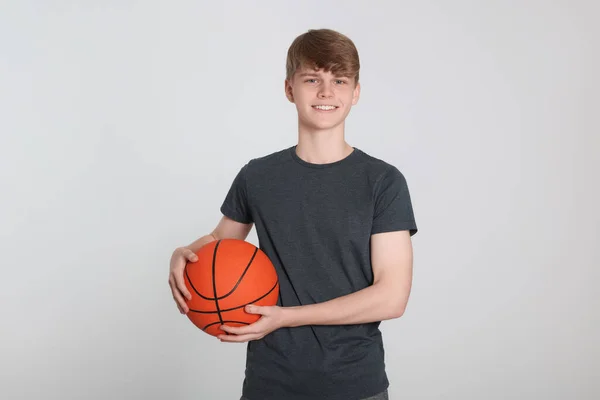 Teenage Boy Basketball Ball Light Grey Background — 图库照片