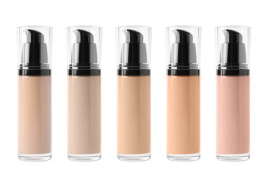 Beyaz üzerine izole edilmiş farklı tonlarda sıvı temeller kümesi