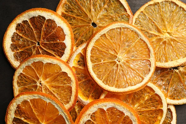 Сухі Апельсинові Скибочки Чорному Столі Плоский Ліжко — стокове фото