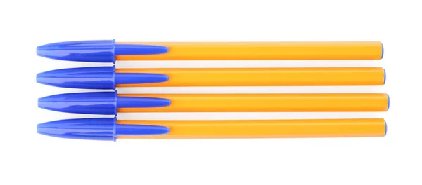 Nowe Pomarańczowe Plastikowe Długopisy Izolowane Białym Widok Góry — Zdjęcie stockowe