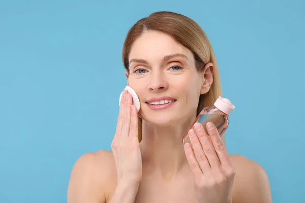 Beautiful Woman Removing Makeup Cotton Pad Light Blue Background — Stock Photo, Image