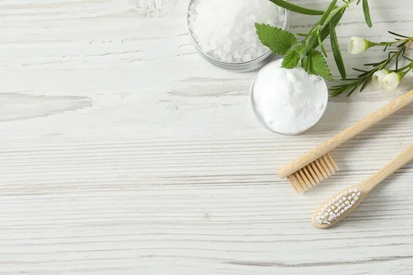 Flat Lay Composition Toothbrushes Herbs White Wooden Table Space Text — Stock Photo, Image