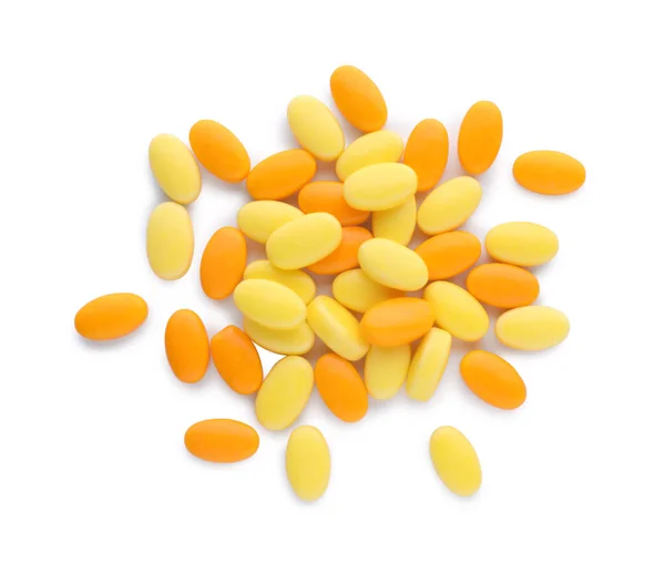Chutné Žluté Oranžové Dragee Bonbóny Bílém Pozadí Pohled Shora — Stock fotografie