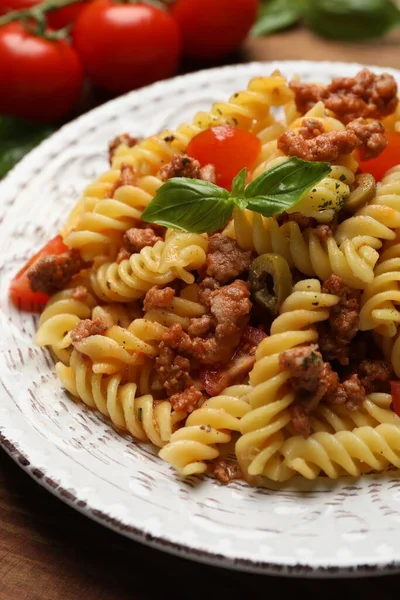 Plate Delicious Pasta Minced Meat Tomatoes Basil Table Closeup — Stock Photo, Image