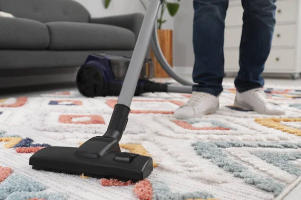 Man Cleaning Carpet Vacuum Cleaner Home Closeup Space Text — Stock Photo, Image