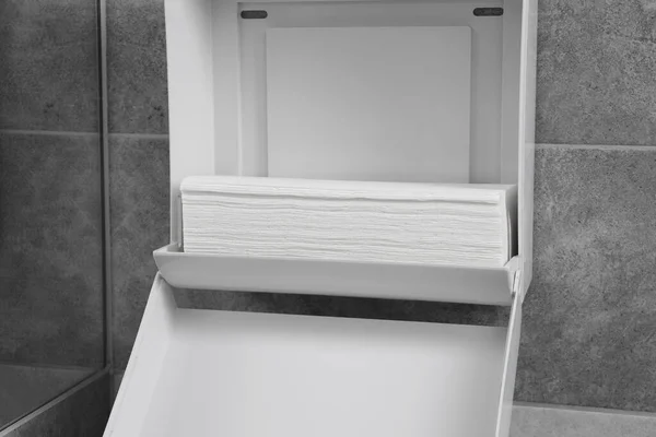 New Open Paper Towel Dispenser Hanging Wall Bathroom Closeup — Stock Photo, Image