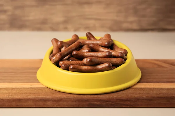 Yellow Bowl Bone Shaped Dog Cookies Wooden Board — Stock Photo, Image