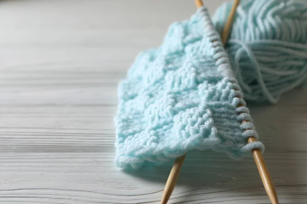 Knitting Soft Turquoise Yarn Needles White Wooden Table Closeup — Stock Photo, Image