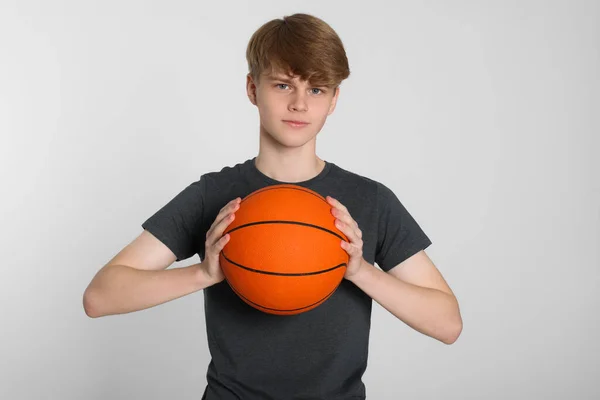 Teenage Boy Basketball Ball Light Grey Background — Φωτογραφία Αρχείου