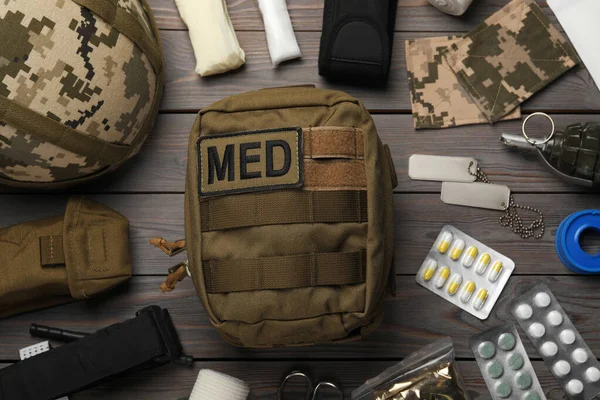 Military First Aid Kit Wooden Table Flat Lay — Stock Photo, Image