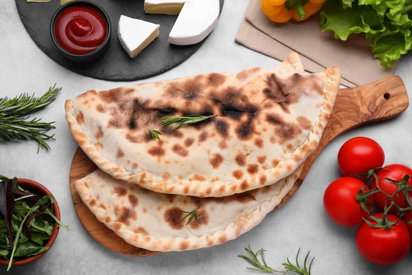 Delicious Calzones Products Grey Table Flat Lay — Stock Photo, Image