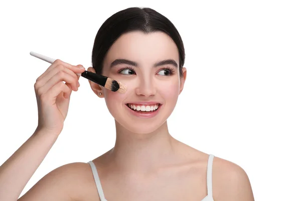 Teenage Girl Applying Foundation Face Brush White Background — Stock Photo, Image