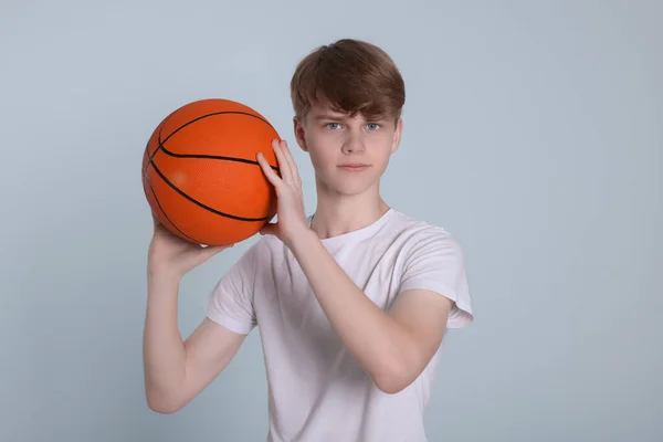 Teenage Boy Basketball Ball Light Grey Background — Φωτογραφία Αρχείου